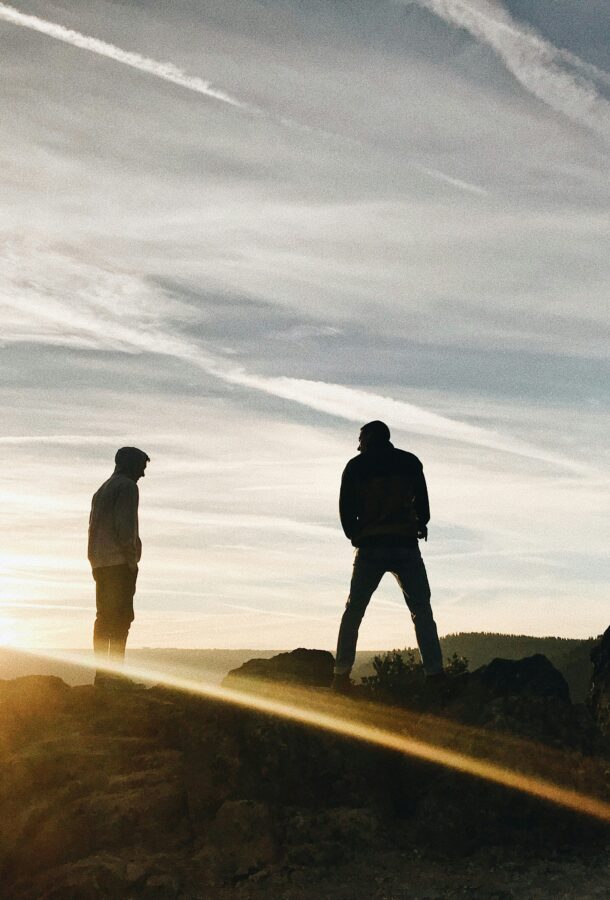 A group of young men embracing the light
