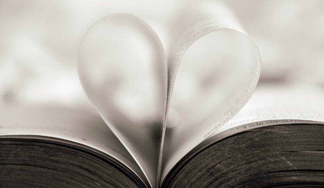 Book pages forming a heart