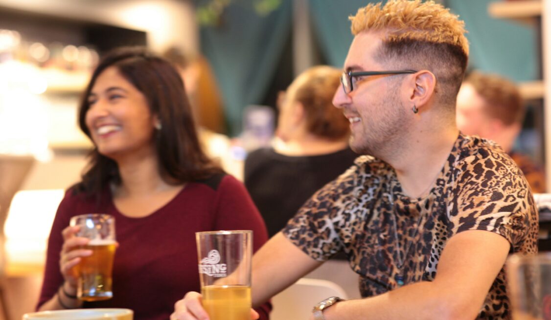 Man and woman drinking beer together
